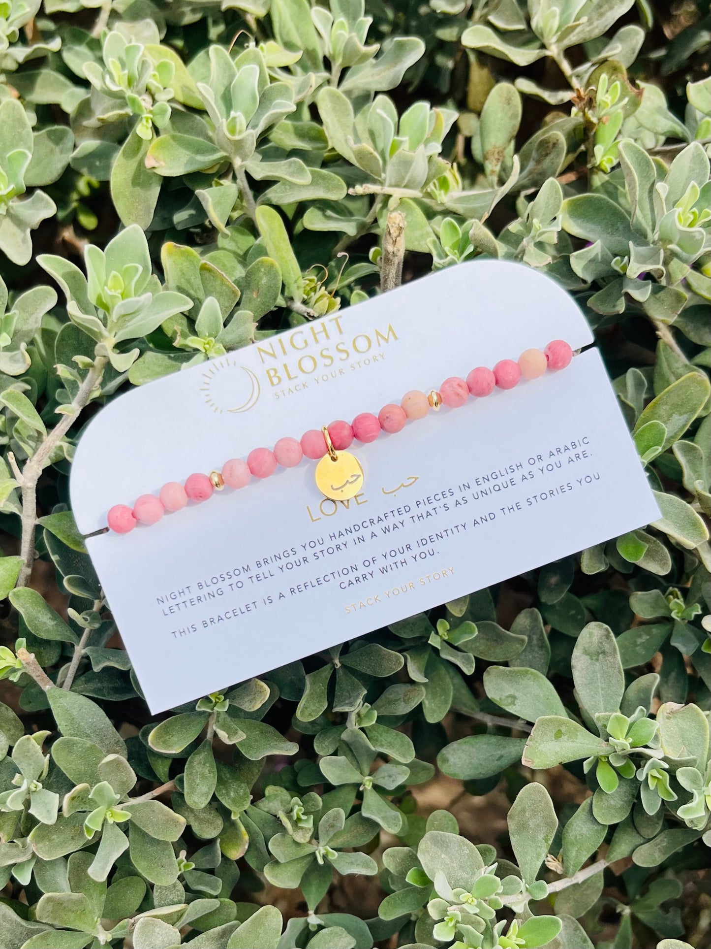 Engraved ‘Love’ charm bracelet in Arabic