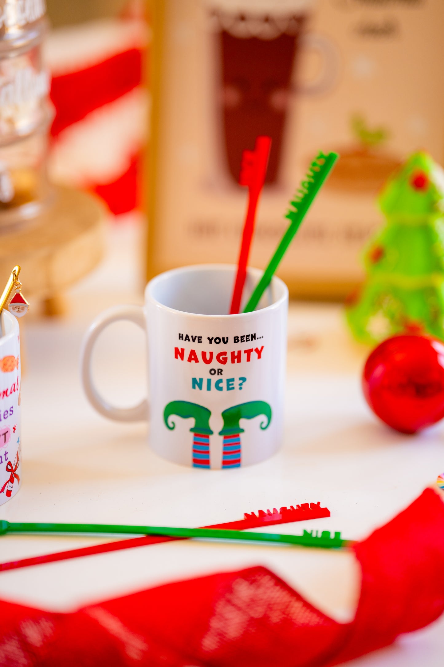Naughty or Nice Elf Mug with naughty/nice stirrers