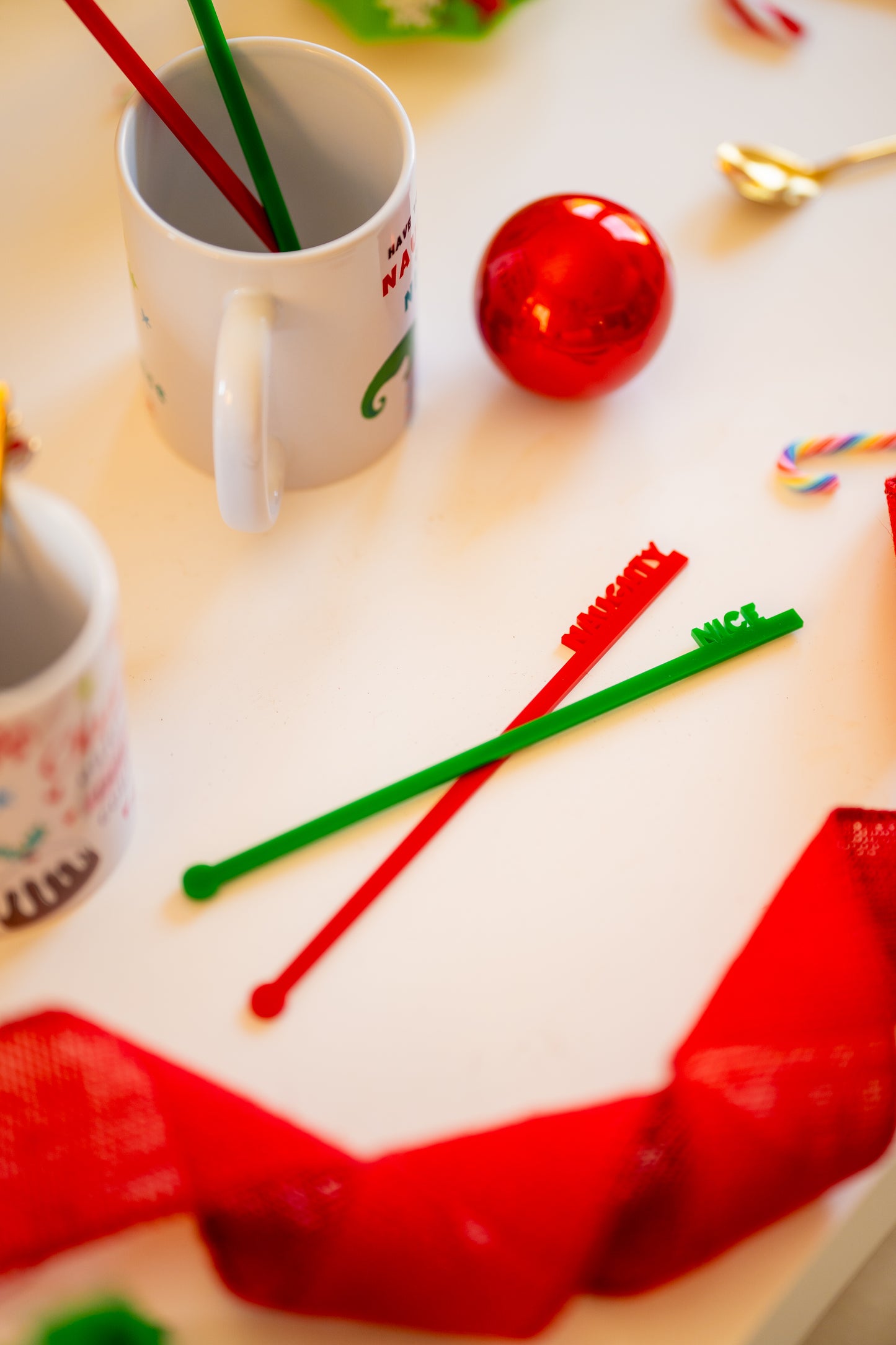 Naughty or Nice Elf Mug with naughty/nice stirrers